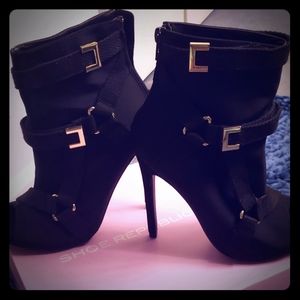 Never worn, size 6 black peep toe ankle boots